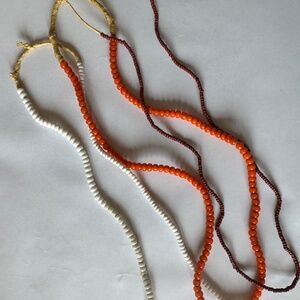 3 glass bead necklaces with raffia cord tie
